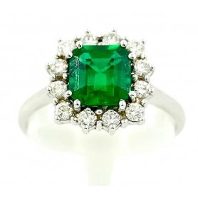 Ring with Colombian Emerald of 1,22 ct in gold and diamonds