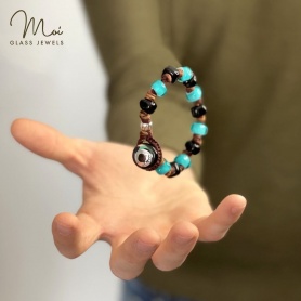 Moi Marinero bracelet with black and turquoise glass beads.