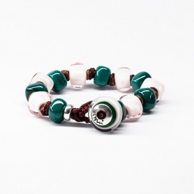 Moi Cloe bracelet with green and pink glass beads.