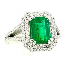 Two carat Colombian Emerald ring in gold and diamonds