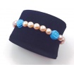 Elastic purple pearls bracelet with rose in Turquoise - B040G3K