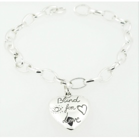 Gucci bracelet with a Blind For Love Heart Charms