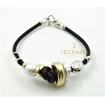 Aurora Misani bracelet with washer bead in gold and silver